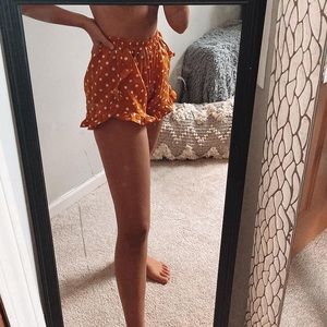 •Orange, Polka-dotted shorts•